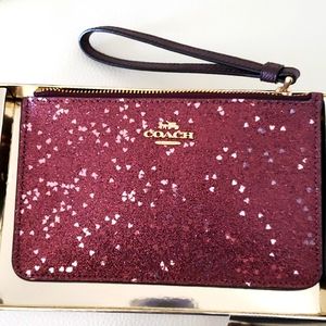NWOT. Coach heart glitter wristlet.